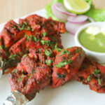 Portion of Mouthwatering Tandoori Chickens Served with Yogurt and Hari Chutney
