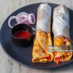 delicious Indian street food "egg rolls" is ready to eat.