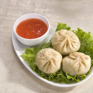 Steam Momos served hot with chutney in Delhi NCR