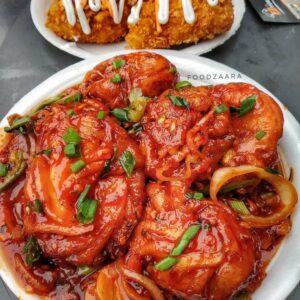 Mix Sauce Momos coated in creamy and spicy sauce in Delhi NCR