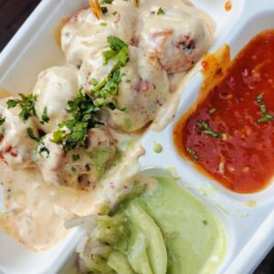 White Sauce Momos served in creamy white gravy